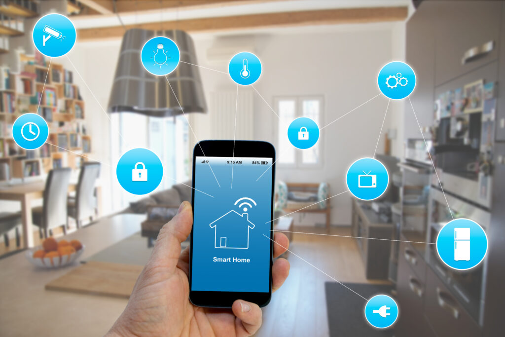 Smart Home concept, Hand holding smartphone with smart home application on screen