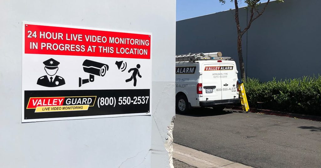 ValleyGuard live video monitoring warning sign showing active monitored security at a Los Angeles site