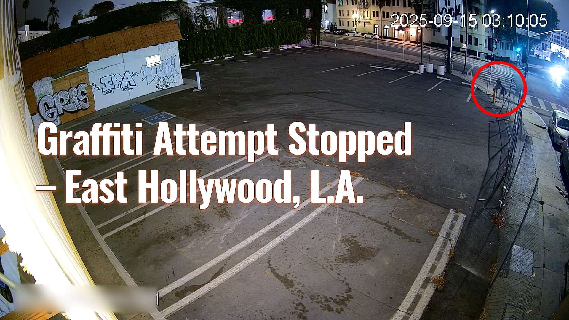 ValleyGuard pole camera surveillance unit with flashing LED lights monitoring East Hollywood commercial property at night to prevent tagger vandalism