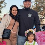 Family with flower crown costume at Valley Alarm Trunk-or-Treat San Fernando Valley Halloween 2025