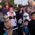 Ninja Turtle Clone Trooper and Victorian costumes with attendees at Valley Alarm Trunk-or-Treat San Fernando Halloween 2025