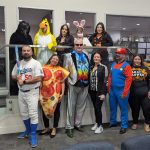 Valley Alarm team costumes pizza dinosaur Mario at Trunk-or-Treat San Fernando Halloween 2025