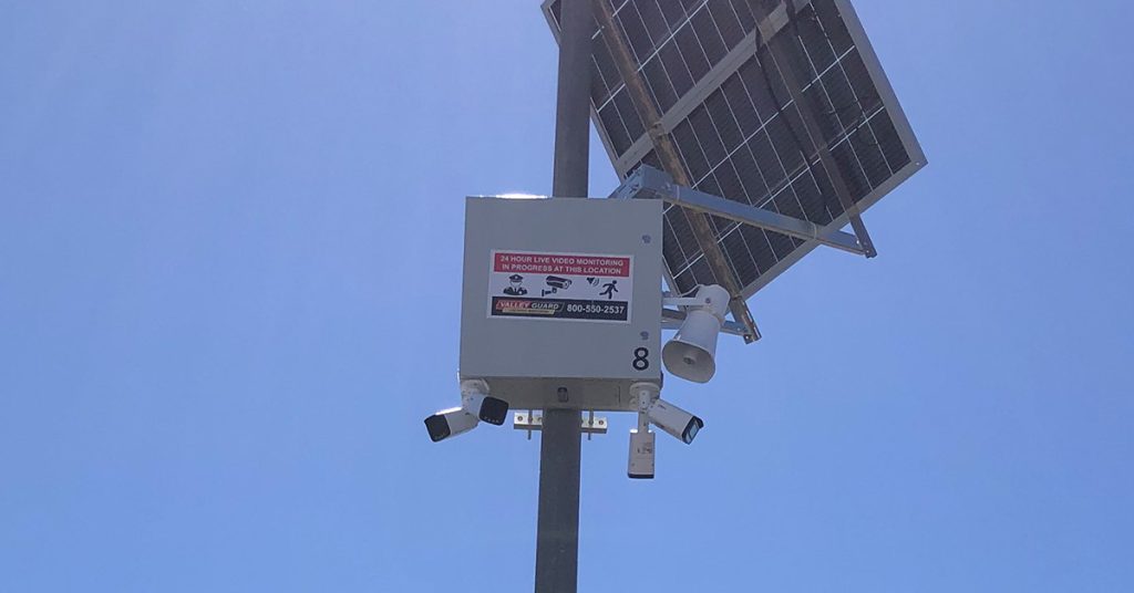 best remote security monitoring for construction sites solar pole-mounted camera with live video monitoring signage