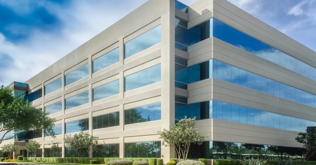 Modern multi-story commercial office building protected by remote video monitoring in Los Angeles